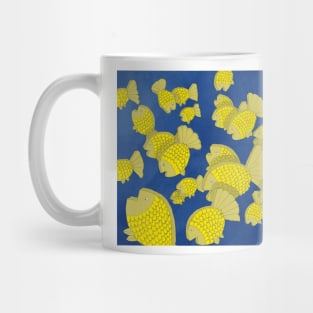 Flat, golden fish in a pack II Mug